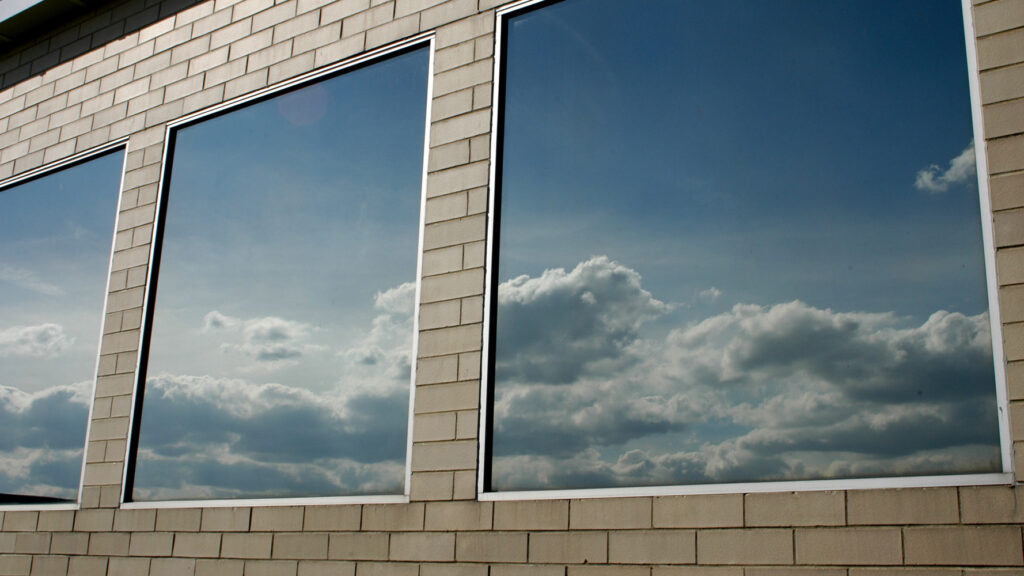 Reflective glass sun protective film in chennai